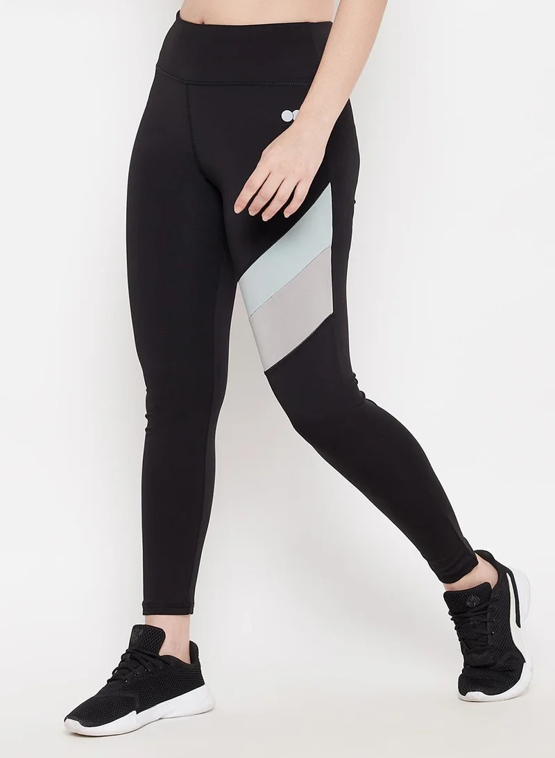 Clovia Black Snug Fit High-Rise Active Tights in Black for Women | Best Price UAE
